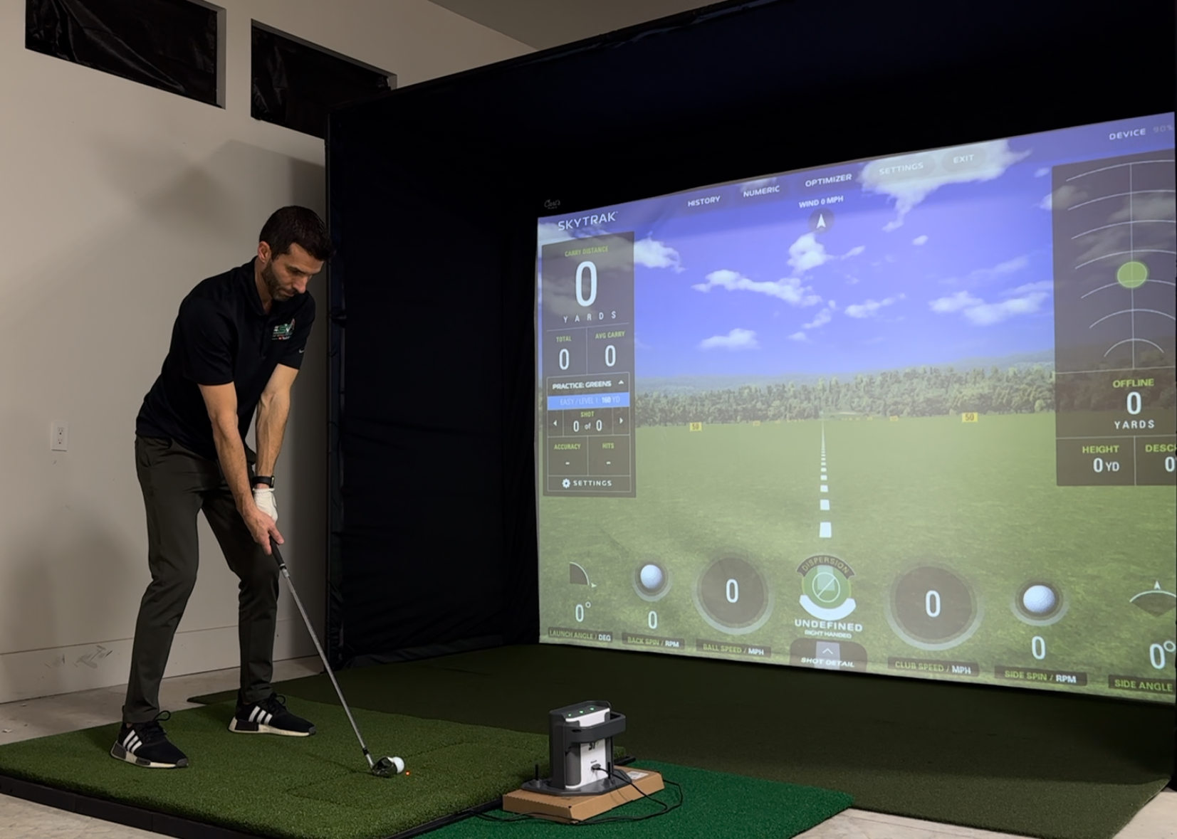 Carl's DIY golf simulator enclosure updated ground level screen